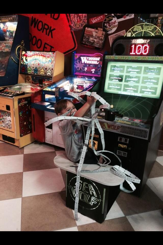 Boy winning tickets at the arcade