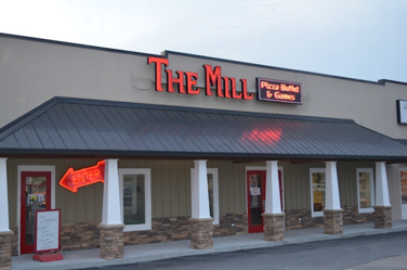 The Mill Pizza Buffet exterior at dusk