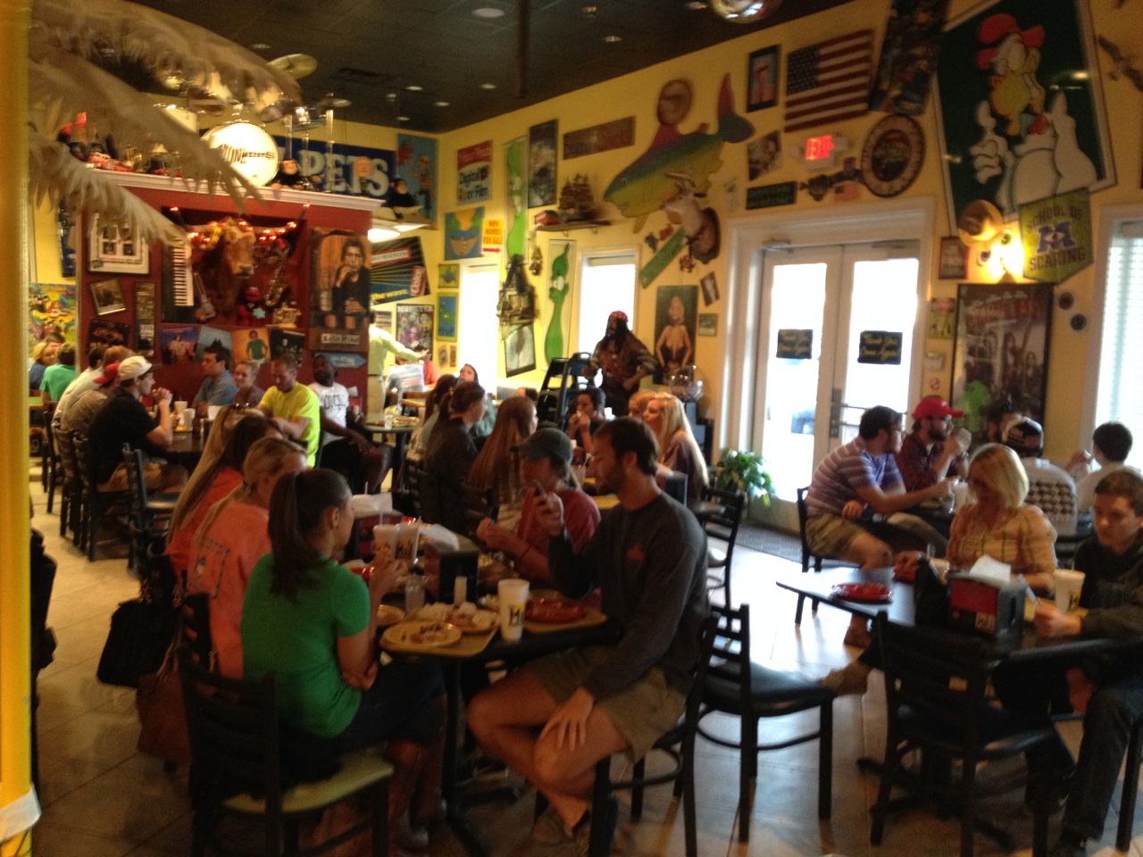Busy dining room full of happy customers